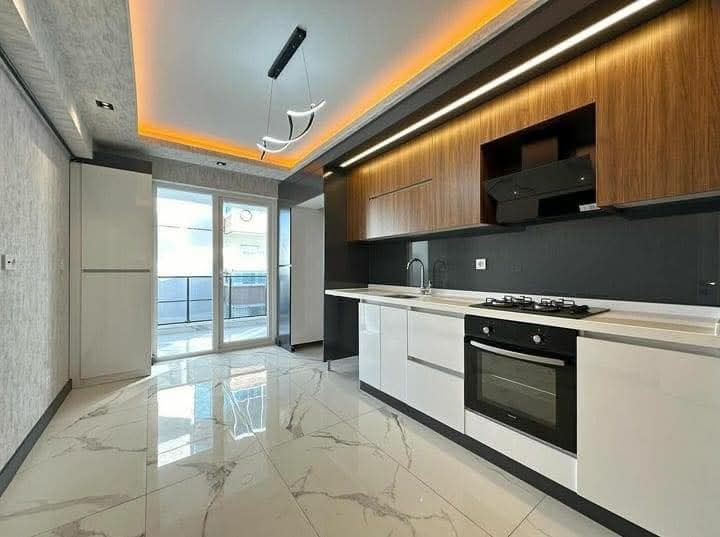 تركيب مطبخ المنيوم بتصميم خشبي بالرياض - مطابخ خبراء الرياض